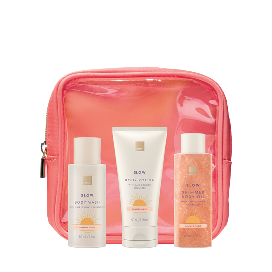 4 Piece Summer Oasis Travel Kit, EWC SLOW travel size products (body wash, body polish and shimmer body oil) arranged in front of a coral pouch.